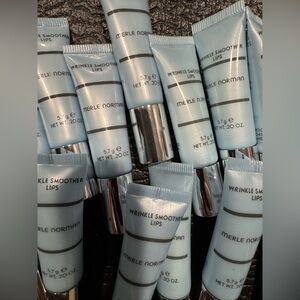 Merle Norman Lip Smoother in Silver and Light Blue